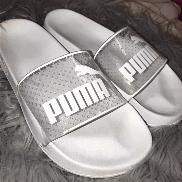clear and white puma slides